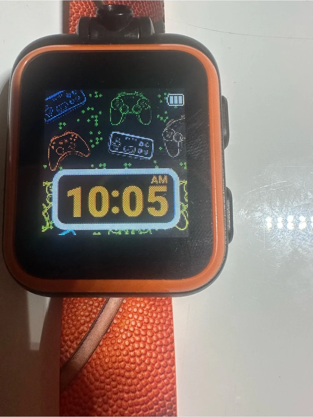 Orange-Trim Smartwatch with Orange Textured Band and Camo Face